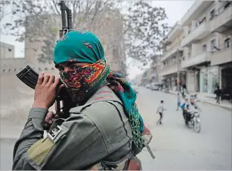  ?? HUSSEIN MALLA THE ASSOCIATED PRESS ?? As the U.S. prepares to remove 2,000 troops, there are concerns the Islamic State may reappear or Turkey may threaten Syrian Kurds. Above, member of the Kurdish internal security forces during a patrol in Syria.