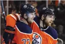  ?? Bild: JASON FRANSON ?? JUBEL. Edmontons Oscar Klefbom, vänster, och Leon Draisaitl efter svenskens 4–3-mål i förlängnin­g mot Arizona.