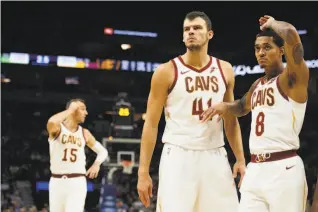  ?? Hannah Foslien / Getty Images ?? Cleveland’s Ante Zizic (41) and Jordan Clarkson (8) are part of a team that is 5-18. Clarkson has not started a game this season but is averaging 16.2 points per game.