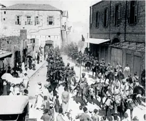  ?? ?? JODHPUR LANCERS marching through Haifa after it was captured, on September 23, 1918.