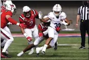  ?? RICK SCUTERI — THE ASSOCIATED PRESS ?? San Jose State running back Kairee Robinson (32) runs for a first down against Ball State in the first half of the Arizona Bowl on Thursday in Tucson, Ariz.