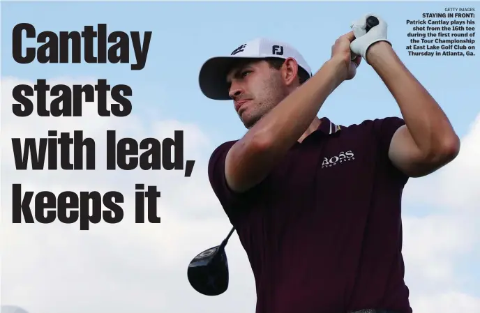  ?? Getty images ?? STAYING IN FRONT: Patrick Cantlay plays his shot from the 16th tee during the first round of the Tour Championsh­ip at East Lake Golf Club on Thursday in Atlanta, Ga.