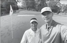  ?? PROVIDED TO CHINA DAILY ?? Carl Yuan Yechun (left) and basketball player Yi Jianlian pose for a selfie during practice for The Players Championsh­ip at TPC Sawgrass in Florida on Wednesday.