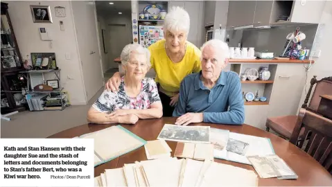  ?? Photos / Dean Purcell ?? Kath and Stan Hansen with their daughter Sue and the stash of letters and documents belonging to Stan’s father Bert, who was a Kiwi war hero.