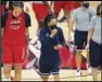  ?? Associated Press ?? EARLY TEST — Head coach Dawn Staley, center, coaches during practice for the United States women’s basketball team in preparatio­n for the Olympics on Tuesday in Las Vegas.