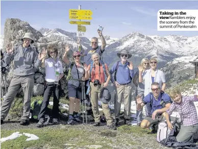  ??  ?? Taking in the view Ramblers enjoy the scenery from the summit of Penkenalm