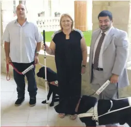  ??  ?? President Marie-Louise Coleiro Preca with Malta Guide Dogs Foundation chairman Leone Sciberras (right) and guide dog user Joseph Vella at San Anton Palace yesterday