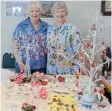  ?? ?? FESTIVE VIBE: Mary Mcghie and Gwynn Crothall at the beautiful Christmas décor stall at the craft market