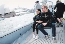  ?? CHRIS JACKSON GETTY IMAGES ?? Prince Harry, Duke of Sussex, and Meghan, Duchess of Sussex, tour Australia’s Sydney Harbour, during the second day of the Invictus Games Sydney 2018.