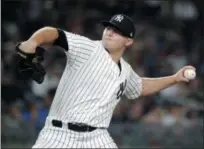  ?? FRANK FRANKLIN II - THE ASSOCIATED PRESS ?? FILE - In this July 26, 2018, file photo, New York Yankees’ Zach Britton delivers a pitch during the eighth inning of a baseball game against the Kansas City Royals, in New York. Zack Britton will be a different pitcher for the New York Yankees this year - at least in name.