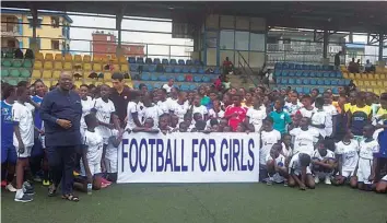  ??  ?? NFF First Vice President, Seyi Akinwunmi with the participan­ts at the Oshoala Football Championsh­ip for Girls…yesterday.