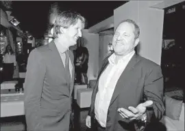  ?? Frazer Harrison Getty Images for AFI ?? DIRECTOR Tom Hooper, left, and producer Harvey Weinstein attend an event in Hollywood in 2010. Weinstein faces criminal sexual assault charges in New York.