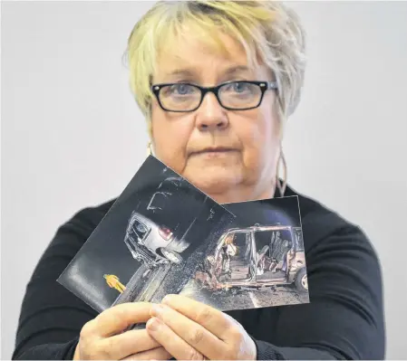  ?? LAWRENCE POWELL ?? Bunny Ruggles holds up photos of the van she was driving on March 17, 2006 when she was struck head-on by an impaired driver coming from the other direction on her side of the road. She was trapped in her vehicle with a smashed hip as a transport truck came barrelling down Highway 101 towards her.