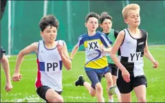  ?? ?? Action from the under-13 boys 1500m