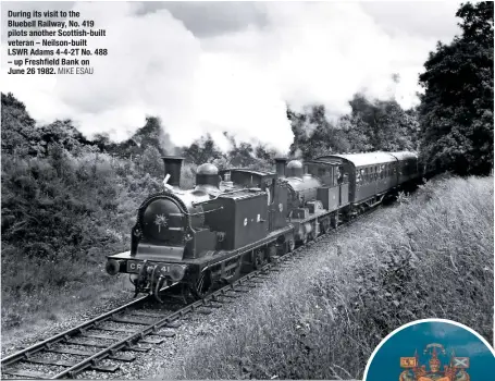  ?? MIKE ESAU ?? During its visit to the Bluebell Railway, No. 419 pilots another Scottish-built veteran – Neilson-built LSWR Adams 4-4-2T No. 488 – up Freshfield Bank on June 26 1982.