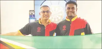  ?? ?? Norman Madhoo, left and Sudesh Fitgerald have qualified for next month’s Dart World Cup in Franfurt, Germany.