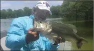  ?? (Arkansas Democrat-Gazette) ?? This 6-pounder was one of 12 bass caught by the author caught Thursday.