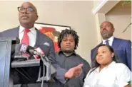  ?? AP PHOTO/SUDHIN THANAWALA ?? From left, Attorney Roderick Edmond, is joined by Treveon Isaiah Taylor Sr., Jessica Ross and attorney Cory Lynch, during a Wednesday news conference in Atlanta.