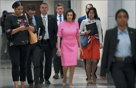  ?? THE ASSOCIATED PRESS ?? House Speaker Nancy Pelosi of Calif., heads to a news conference on Capitol Hill in Washington, Thursday, March 26.