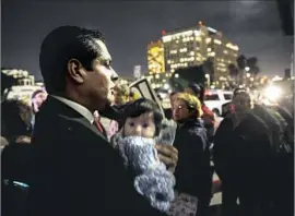  ?? Marcus Yam Los Angeles Times ?? A S S E M B LY M A N Miguel Santiago (D-Los Angeles) attends a rally by Coalition for Humane Immigrant Rights of L.A., demanding answers about recent raids.