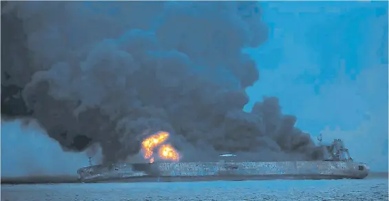  ?? AFP ?? En llamas. Inclinado a estribor, el petrolero Sanchi, de bandera iraní, arde en aguas de China. Beijing teme un gran derrame de crudo.