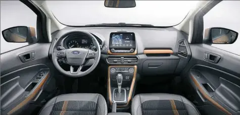  ??  ?? All-new Ford EcoSport SES features unique interior styling cues such as bold copper accents for instrument and door panels along with sport seats.