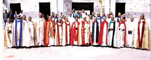  ??  ?? Bishop, Diocese of Isiala Ngwa South, Anglican Communion, Abia State, Rt. Rev. (Dr.) Isaac Chijioke Nwaobia (middle); with Synod Preacher/bishop of Egbu Diocese, Rt. Rev. Geoffrey Okorafor and clergy of the Diocese of Isiala Ngwa South Diocese at the...