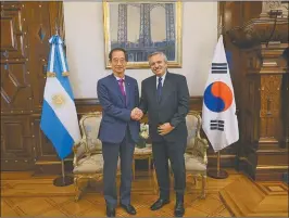  ?? ?? VISITA. El primer ministro coreano junto al Presidente argentino.
