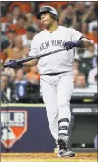  ?? Elsa / Getty Images ?? Edwin Encarnacio­n reacts after striking out against the Astros during Game 6 of the ALCS on Saturday night.