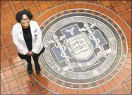  ?? Arnold Gold / Hearst Connecticu­t Media ?? Chelesa Fearce, who has gone from homelessne­ss to becoming a student at the Yale School of Medicine, stands near the entrance to the Harvey Cushing/John Hay Whitney Medical Library in New Haven on Monday.