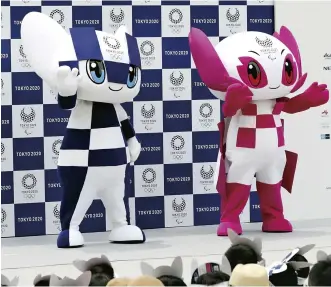  ?? The Yomiuri Shimbun ?? Tokyo Olympic mascot Miraitowa (left) and Paralympic mascot Someity