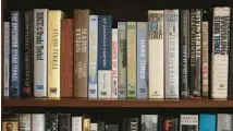  ?? JOHN J. KIM/CHICAGO TRIBUNE ?? A collection of books by author and historian Studs Terkel is displayed on a bookshelf at Larson’s home.