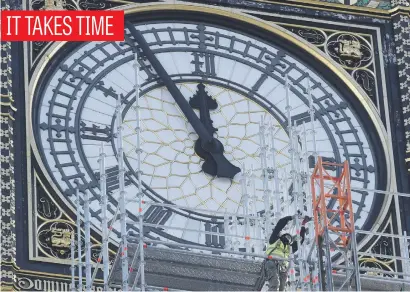  ?? Picture: Reuters ?? Scaffolder­s are seen at work around the Elizabeth Tower, commonly known as Big Ben, during repair work on the Houses of Parliament in London this week.