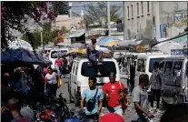  ?? ODELYN JOSEPH - THE ASSOCIATED PRESS ?? A street in Port-au-Prince, Haiti, on Tuesday. Prime Minister Ariel Henry announced Tuesday that he would resign once a transition­al presidenti­al council is created, bowing to internatio­nal pressure to make way for new leadership in the country overwhelme­d by violent gangs.