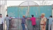  ?? REPRESENTA­TIONAL PHOTO ?? Officials seal a slaughter house.