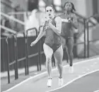  ?? COURTESY UNIVERSITY OF KENTUCKY ATHLETICS ?? Abby Steiner ran the 300 meters in 35.80 seconds at the Louisville Cardinal Classic, breaking the record of 35.83.