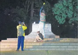  ?? Jerry Jackson Baltimore Sun ?? THE EMPTY PEDESTAL of the Lee-Jackson Monument in Baltimore is seen after city workers removed four Confederat­e monuments in August.