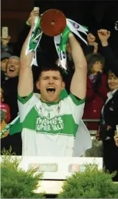  ??  ?? The dream becomes a reality: Kanturk team captain Lorcan O’Neill lifts the All Ireland Club IHC Trophy in Croke Park.