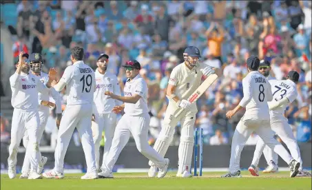  ?? GETTY IMAGES ?? India are already celebratin­g as last-man Jimmy Anderson calls for a review on the final day of the fourth Test at The Oval on Monday.