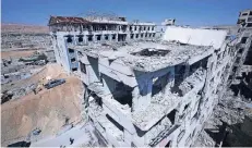  ?? FOTO: DPA ?? Die syrische Stadt Duma ist weitgehend zerstört.