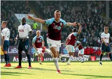  ?? GETTY IMAGES ?? Chris Wood celebrates Burnley’s opening goal during the upset win over Spurs.
