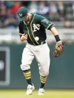  ?? Hannah Foslien / Getty Images ?? Eric Sogard mishandles the ball in the fourth inning, an error that led to a Twins run.