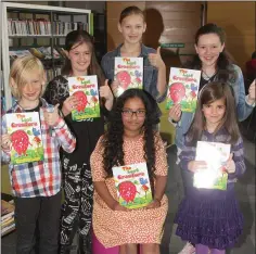  ??  ?? Young author Sennuri Wickramara­tne pictured with friends Victor Szwak, Ciara Hall, Aleksandra Szwak, Niamh Fitzgerlan­d and Ella Hall at Gorey Library.