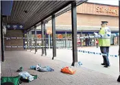  ??  ?? The knifeman, who was described as ‘out of it’, attacked four women in the Sainsbury’s car park in south-west London