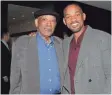  ?? DAVE ALLOCCA, STARPIX/REX/SHUTTERSTO­CK ?? Willard Smith Sr. and Will Smith at a New York screening of Concussion in 2015. The actor’s father died last month.