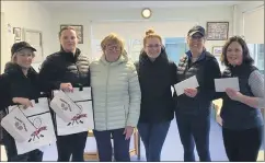  ?? ?? Emly Spring League WD6 winners Hannah Finn and Triona Griffin, at the presentati­on along with runners-up Susan Griffin and her partner Vikki, pictured with the organisers.