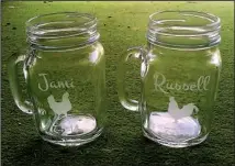  ?? Photo courtesy of JAMI ANDERSON ?? Jami Anderson and Russell Kirchner of Nashville, Tenn., recently personaliz­ed their wedding in Little Rock with a Mason jar theme, drinking from and serving their guests beverages in the jars.