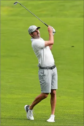  ?? DANA JENSEN/THE DAY ?? Chris DeLucia follows his shot from the fairway during Saturday’s championsh­ip flight match in the 97th Norwich Invitation­al at the Norwich Golf Course. DeLucia won his second title with a 4 and 3 victory over Holden Sullivan.