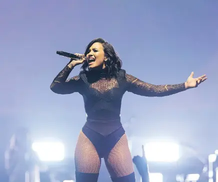  ?? THE ASSOCIATED PRESS ?? Former Disney star Demi Lovato, seen performing in 2016, made headlines this week when she suffered a drug overdose.