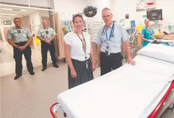  ?? Pictures: MIKE BATTERHAM ?? Clockwise from left, Gold Coast University Hospital security officers Sam Glassie and Brad Boyle, nurse Fiona Schultz, nurse Greg Carson and Gold Coast Health executive director of people and engagement Hannah Bloch.